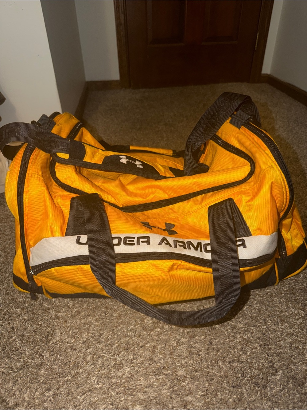 Under Armour Men's Orange Duffel Bag with Black Accents